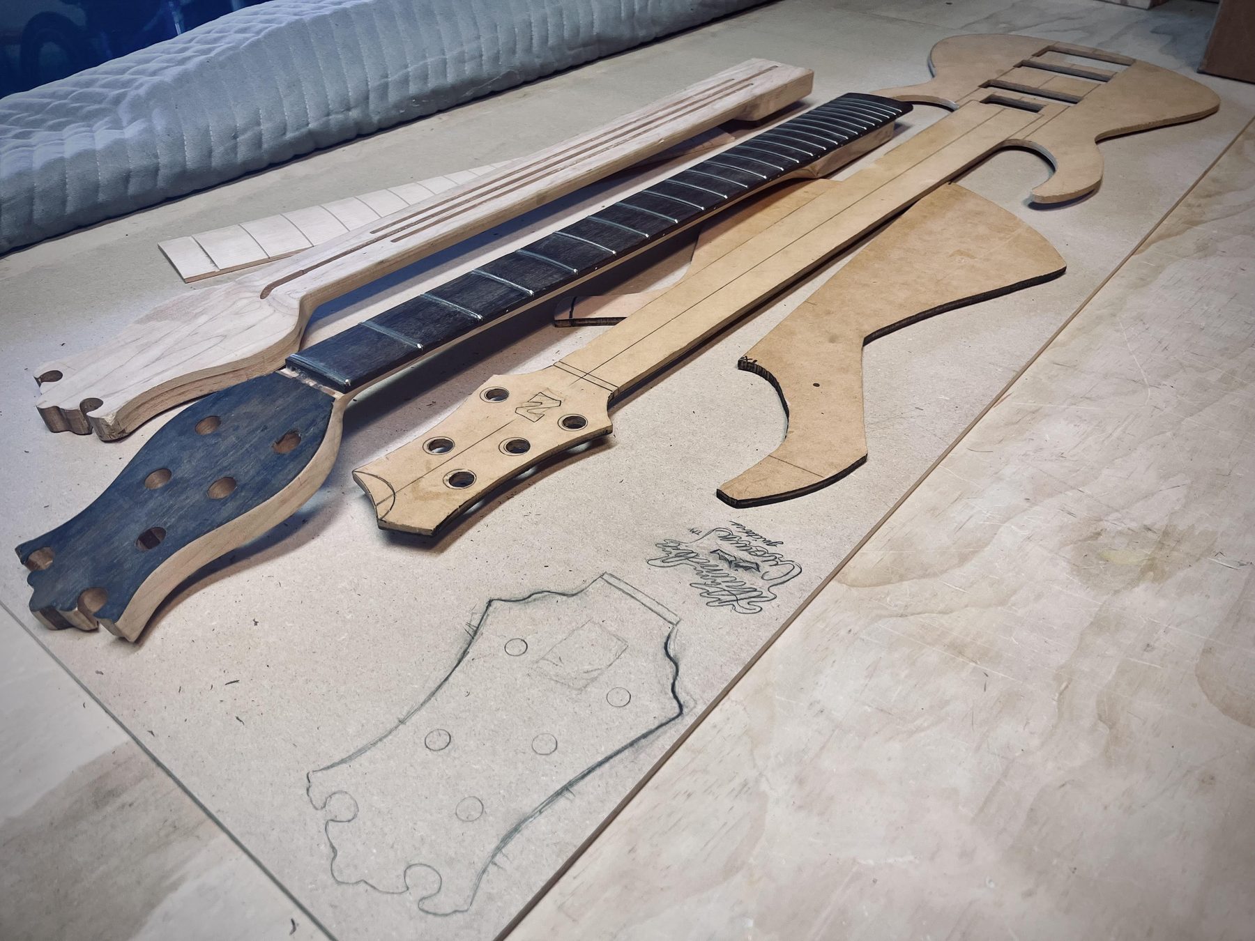 Necks, fretboards and templates mid-build